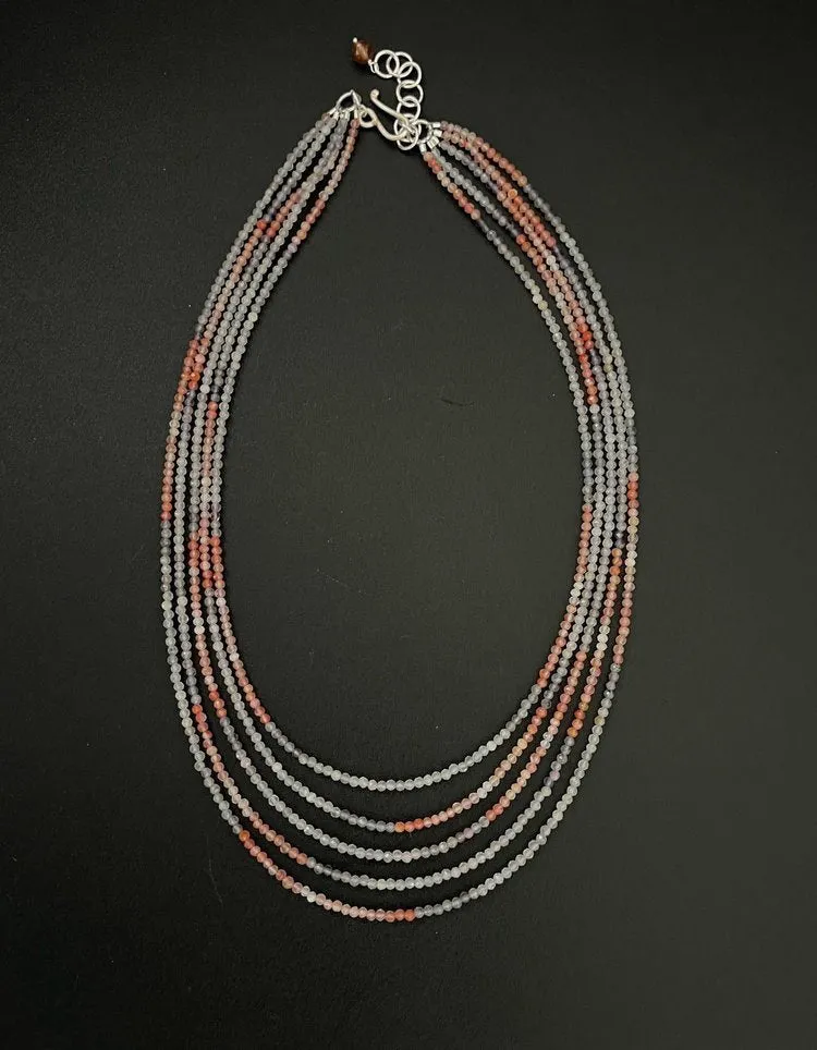 ANN LIGHTFOOT - FIVE TRAND IOLITE AND CARNELIAN STRAND NECKLACE