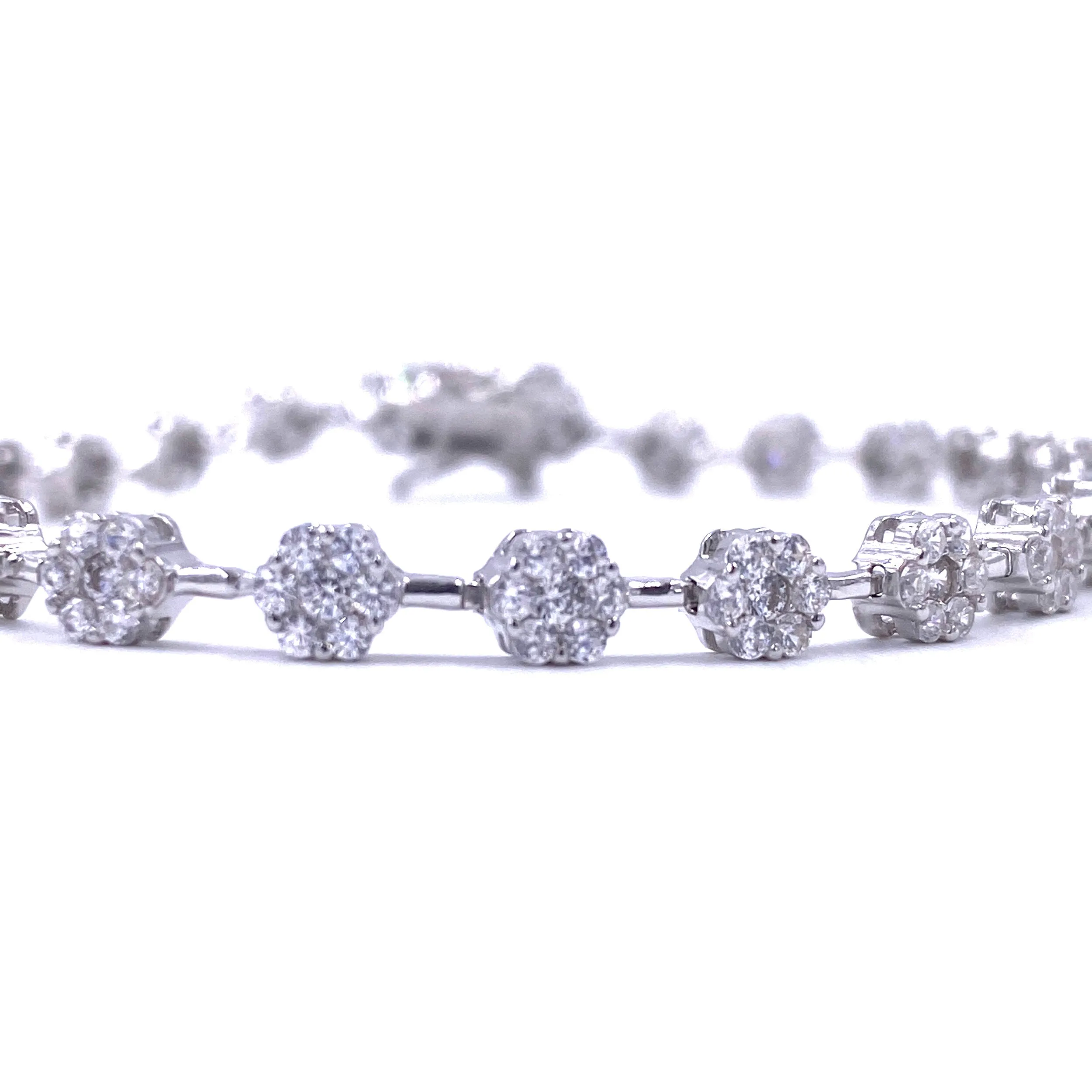 Ashley Gold Sterling Silver CZ Flower Design Tennis Bracelet