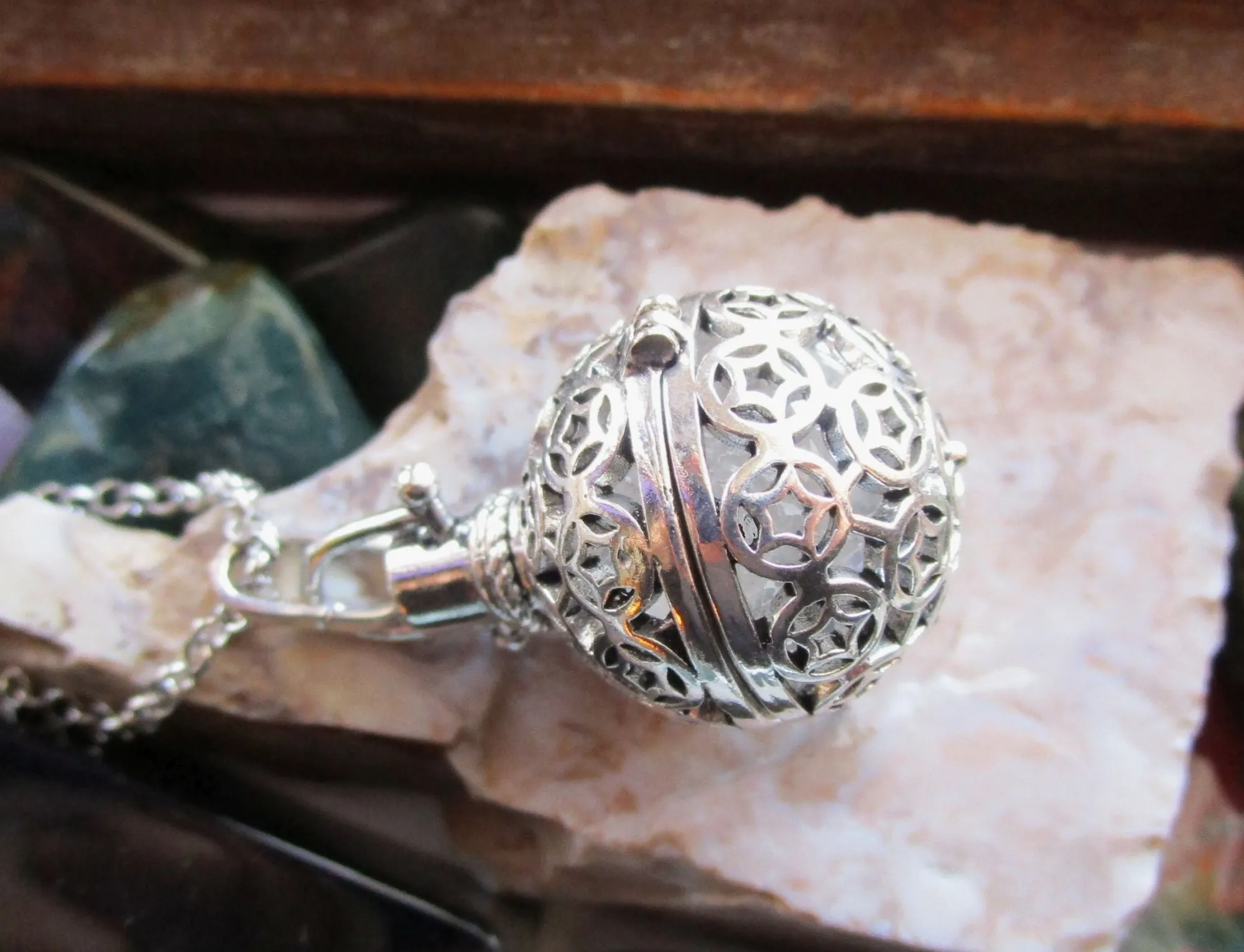 Caged Silver Stars Quartz Crystal Ball Pendant Necklace