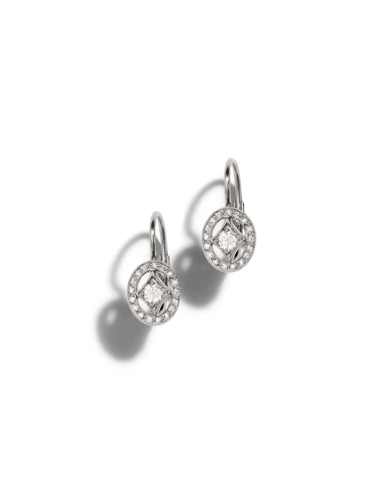 Oval Diamond Frame Platinum Earrings