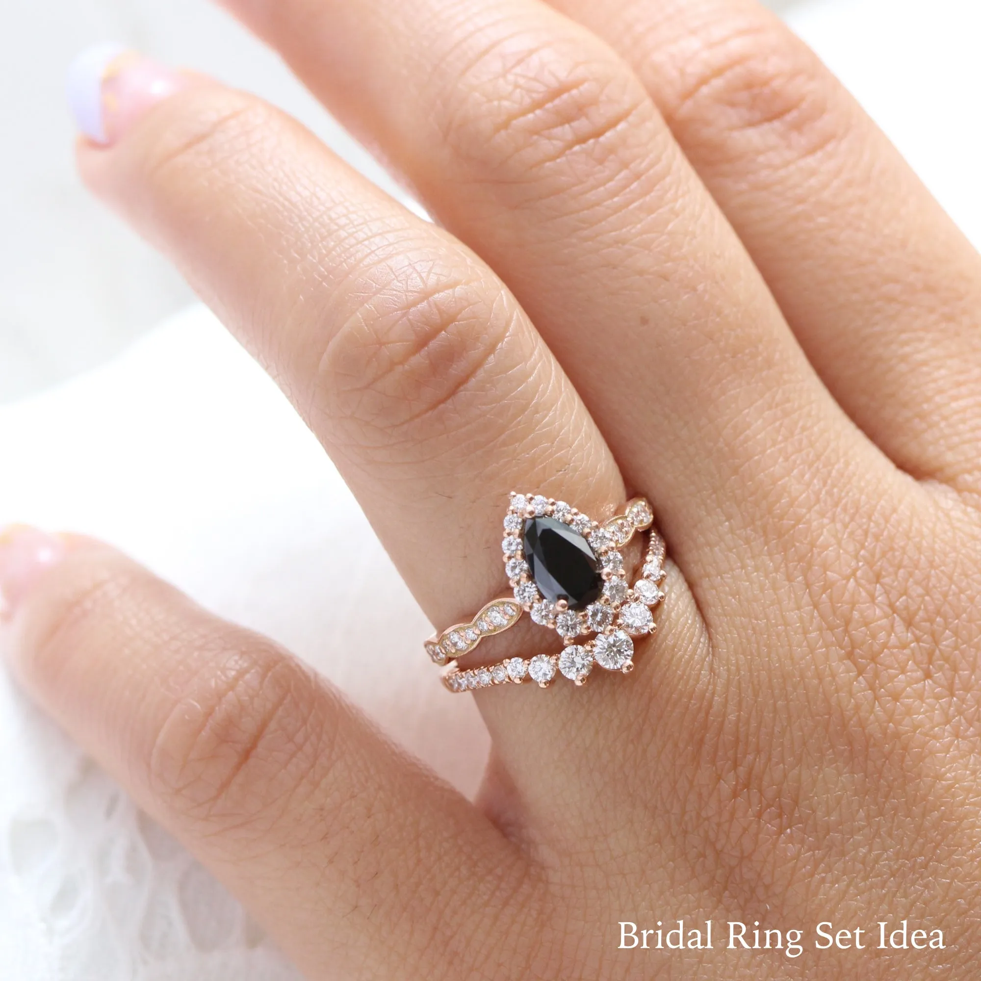 Pear Black Diamond Engagement Ring in Tiara Halo Diamond Scalloped Band