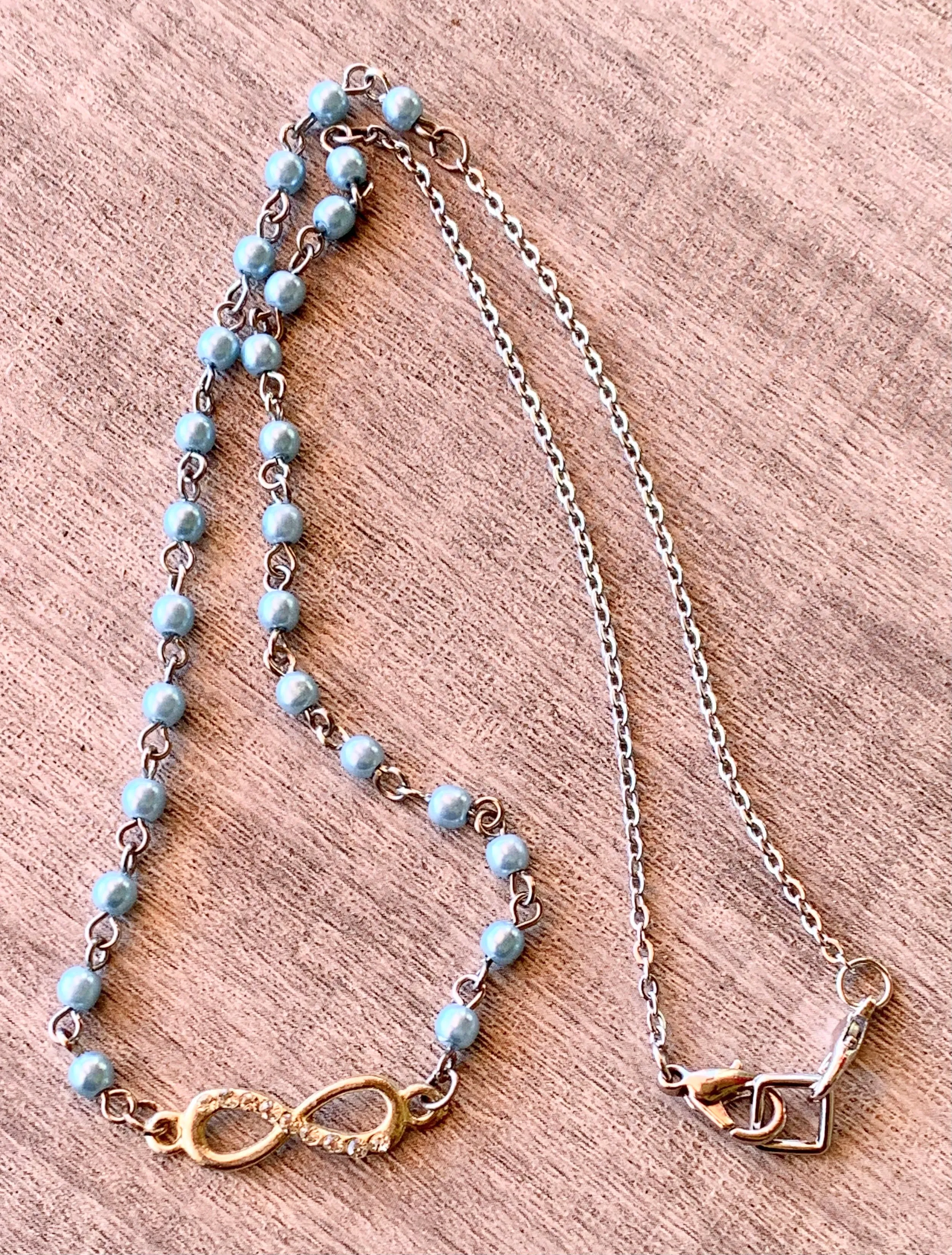 Talia Handmade Faux Powder Blue Pearl Infinity Necklace/ Choker