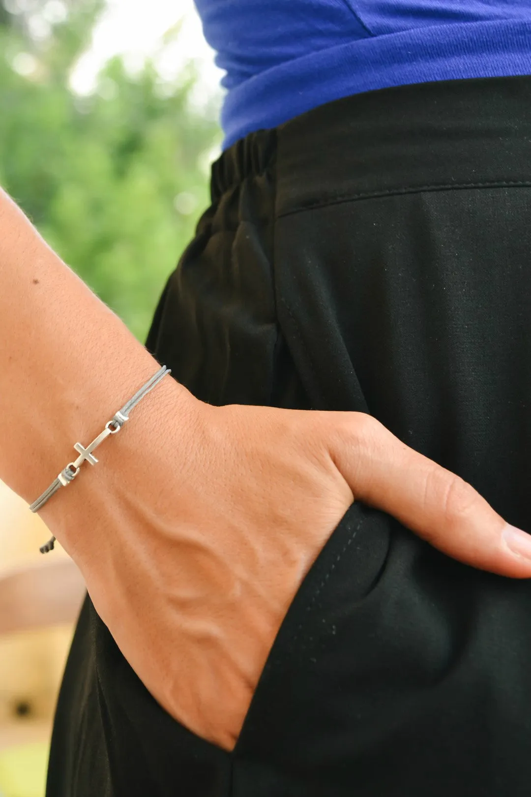 Women bracelet with silver cross charm, Gray cord, adjustable